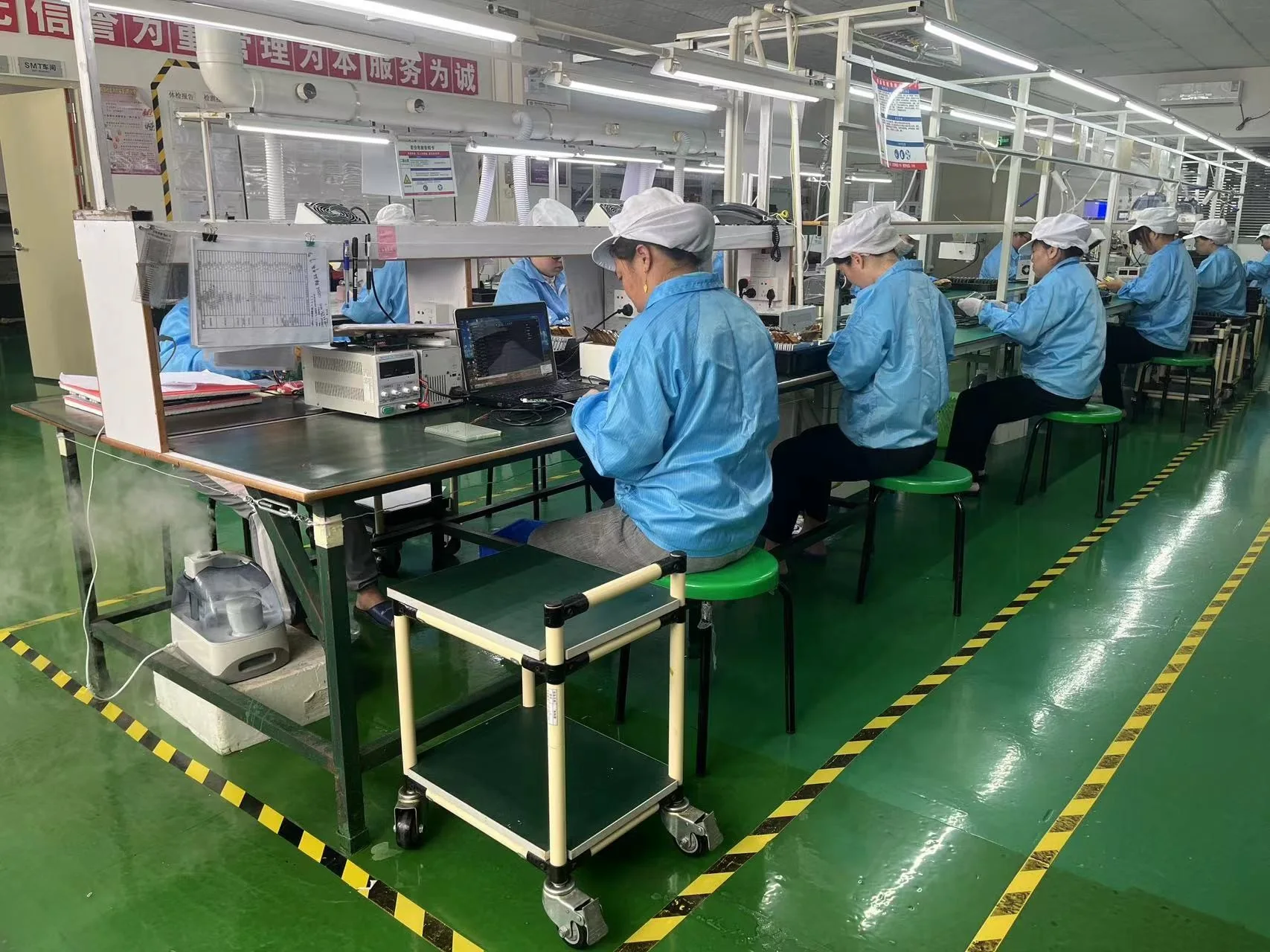 Operators at the Junxian module assembly line